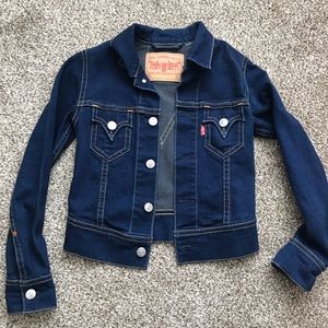 Blue vintage Levi’s denim jacket.